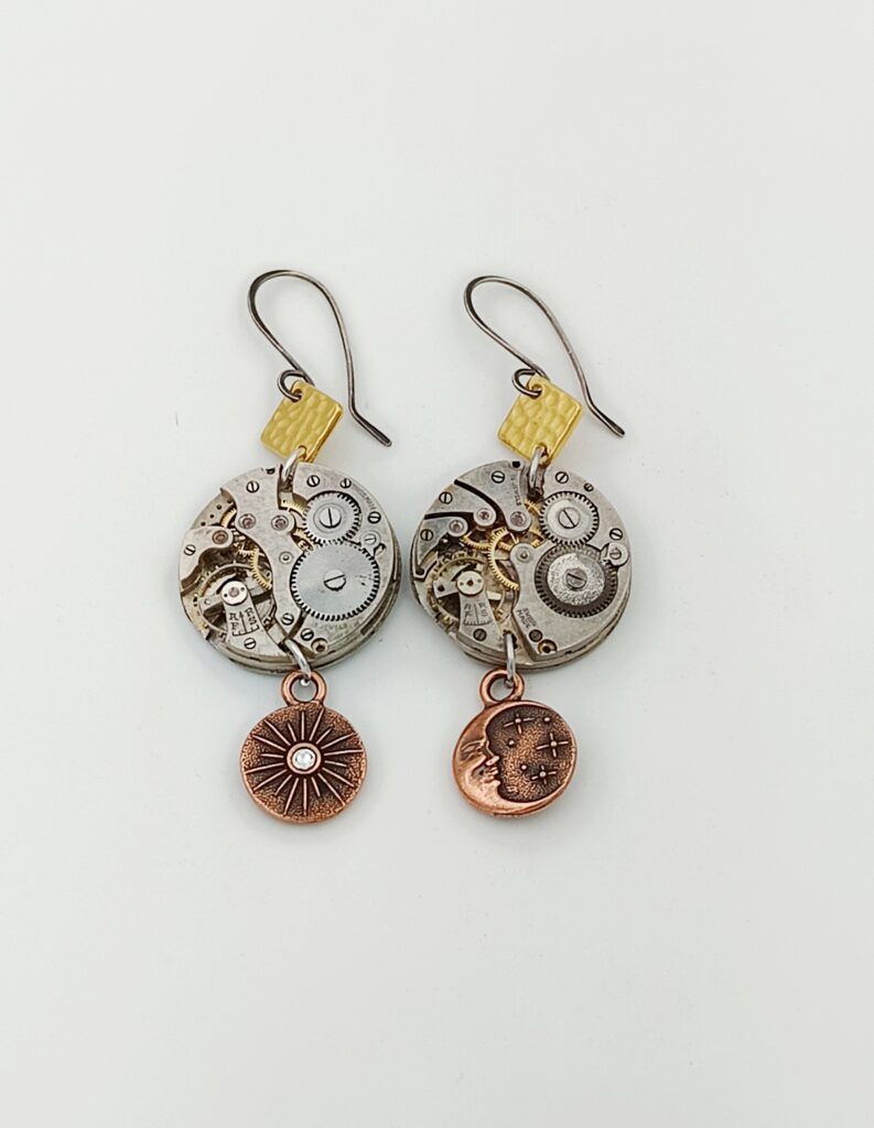 Boucles d'oreilles argent or mouvement montre