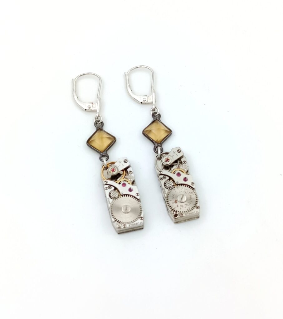 Boucles d'oreilles topaze argent rubis montre