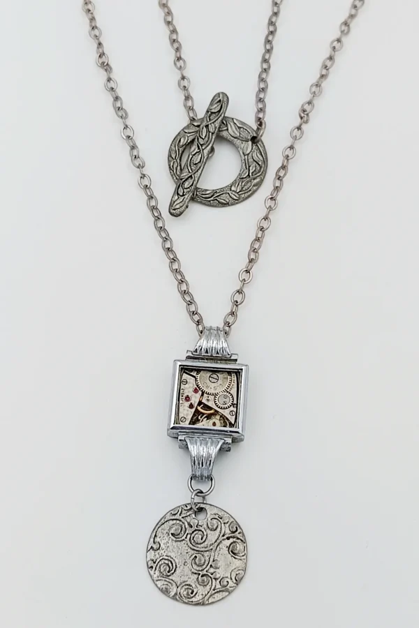 Sautoir argent Art Nouveau rubis montre